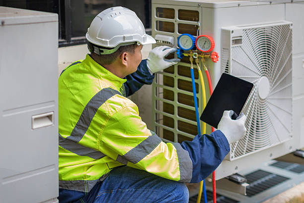 Professional Heat Pump Repair technician working in Somerville, OH